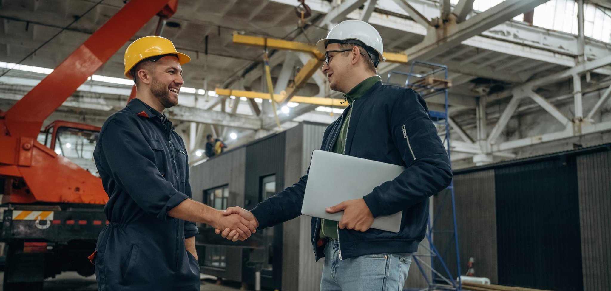 Facility management shaking hands